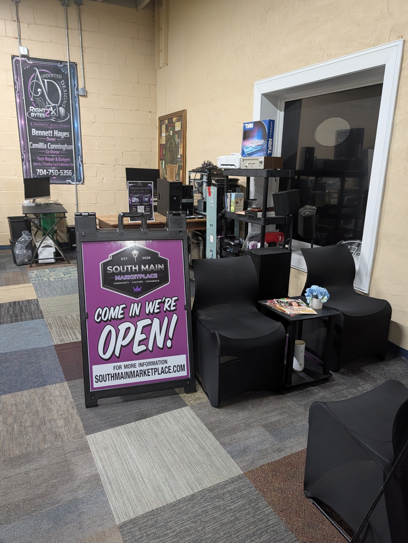 Come in we're open — South Main Marketplace sign